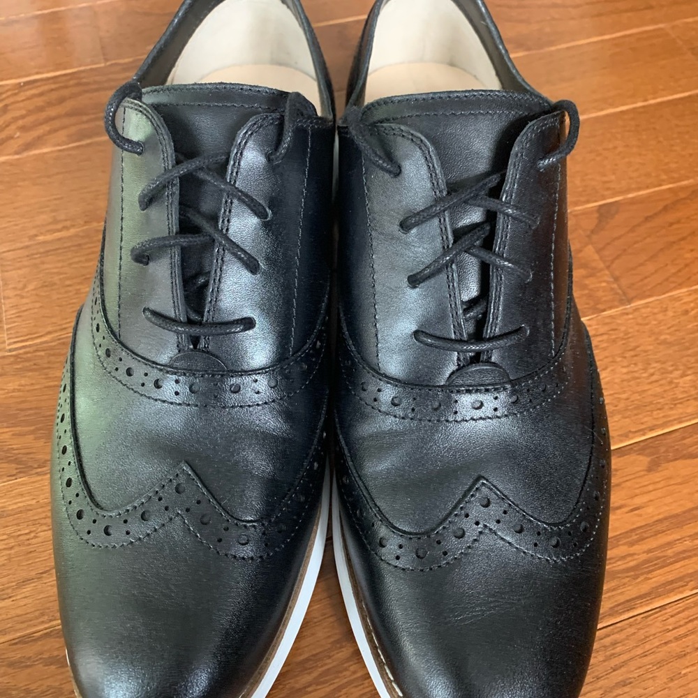 Brand new without tags men’s black wingtip dress shoes. Never worn